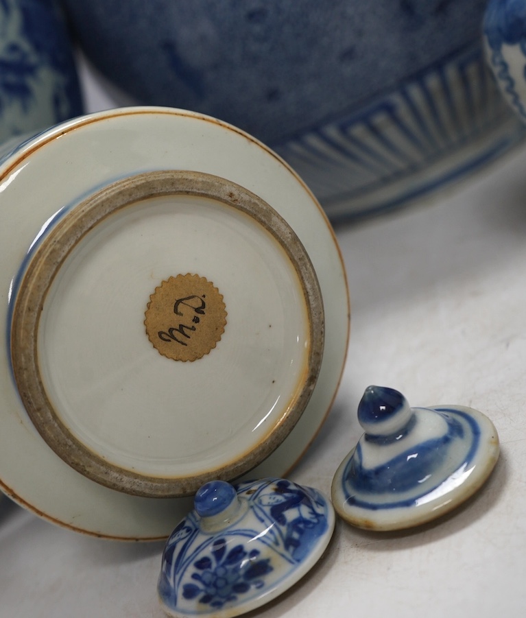 Four Chinese blue and white vases, a jar and cover and a tea bowl, Kangxi to 20th century, tallest vase 38cm high. Condition - poor
